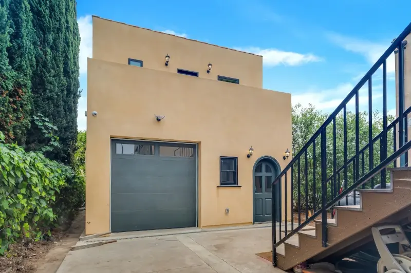2-story ADU — attached garage with Spanish tile roof