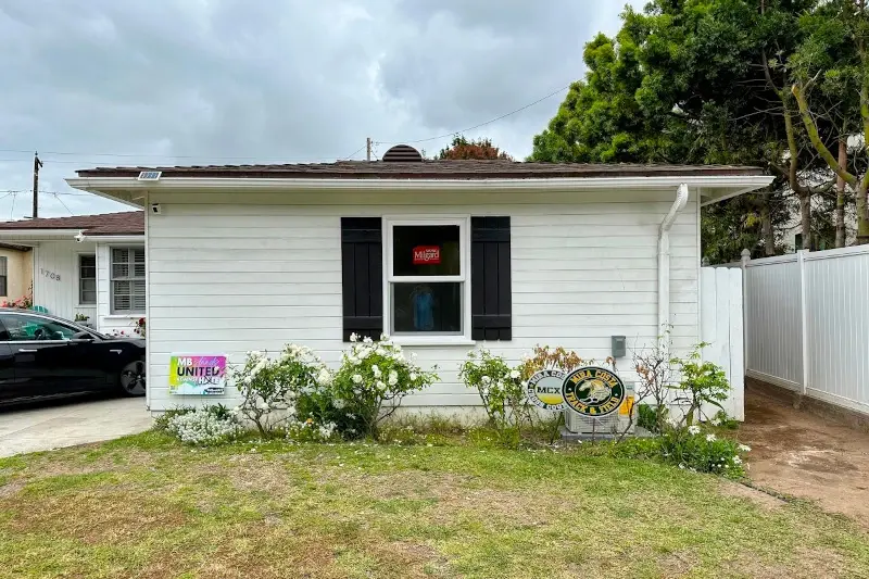 Manhattan Beach garage conversion — front elevation, indistinguishable from original