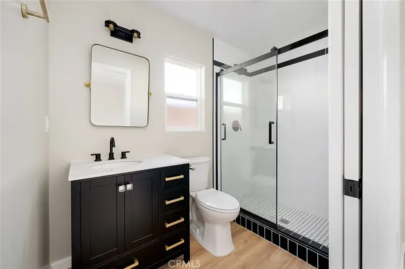 Pasadena farmhouse garage conversion — bathroom