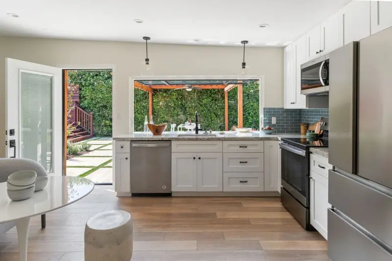 Spanish bungalow garage conversion — great room