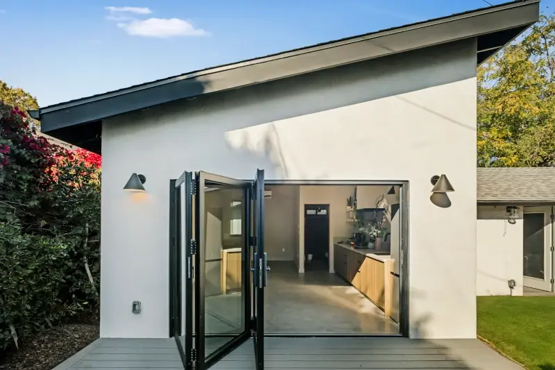 Mid-City shed roof ADU — front door entry