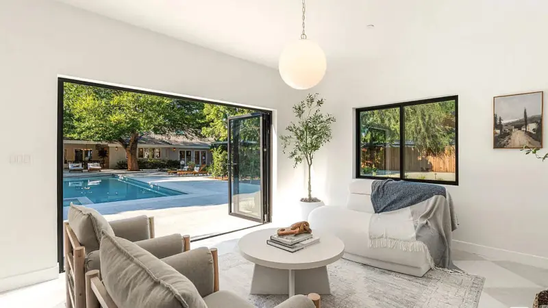 Woodland Hills ADU — pool lounge with tri-fold glass doors