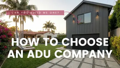 California homeowner reviewing an ADU construction contract on a kitchen table with a clipboard of questions and three side-by-side ADU company proposals