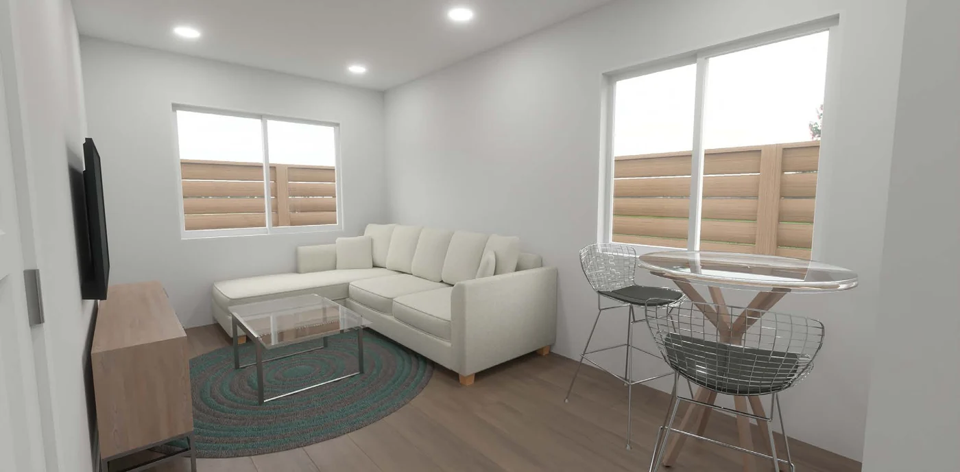 Living and dining area inside a CALI ADU stacked duplex unit