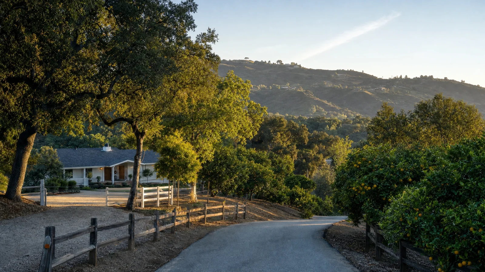 Building an ADU in La Habra Heights, CA — a curbless rural canyon road through avocado and citrus groves below the Puente Hills, where CALI ADU designs and permits single-storey backyard ADUs under LHHMC Ch. 7.28